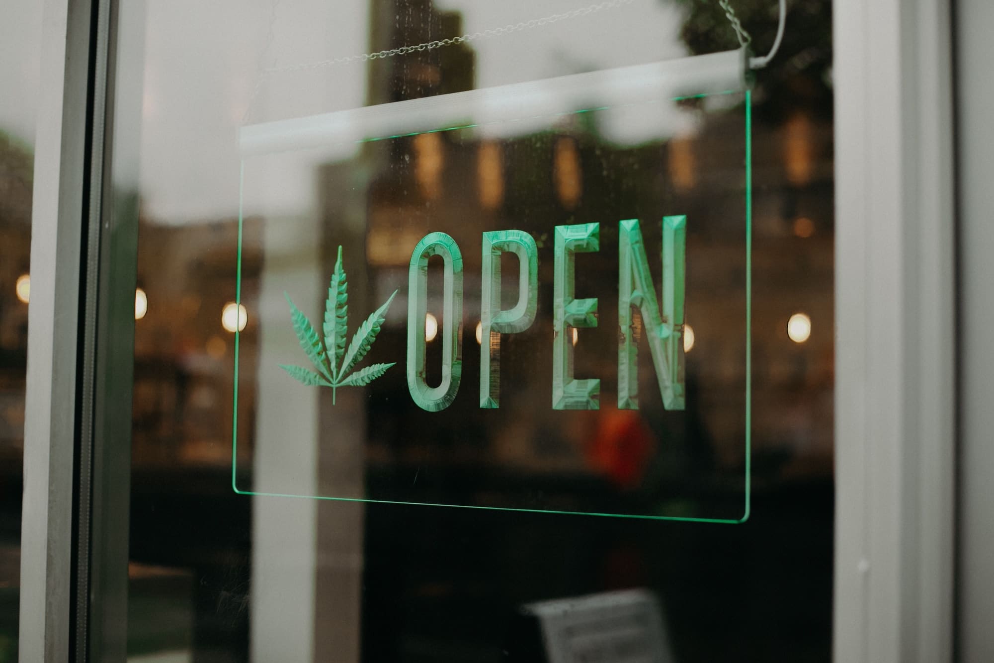 Hemp marijuana cbd open for business sign at a dispensary